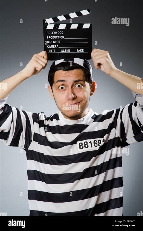 Inmate With Movie Clapper Board Stock Photo Alamy