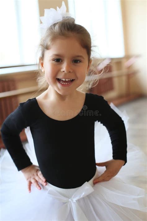 Vertical Closeup Portrait Of A Little Smiling Ballerina Girl Stock