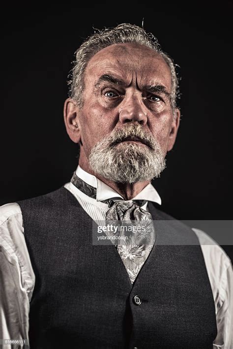 Vintage Characteristic Senior Man With Gray Hair And Beard High Res