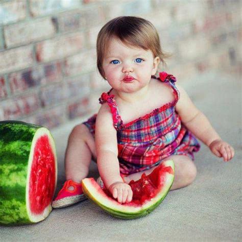 Cute Baby Girl Eating Watermelon