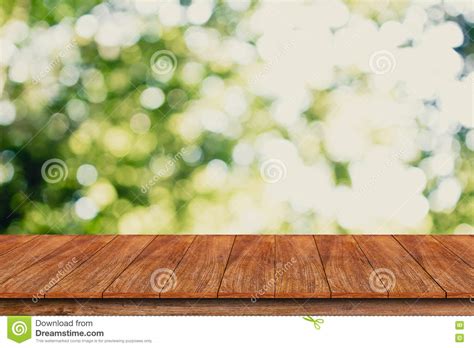 Wood Table Top On Bokeh Abstract Green Background Stock Image Image