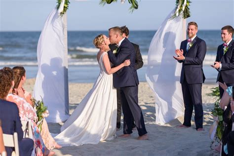 fun beach wedding with a large bridal party ocean club at grande dunes in myrtle beach