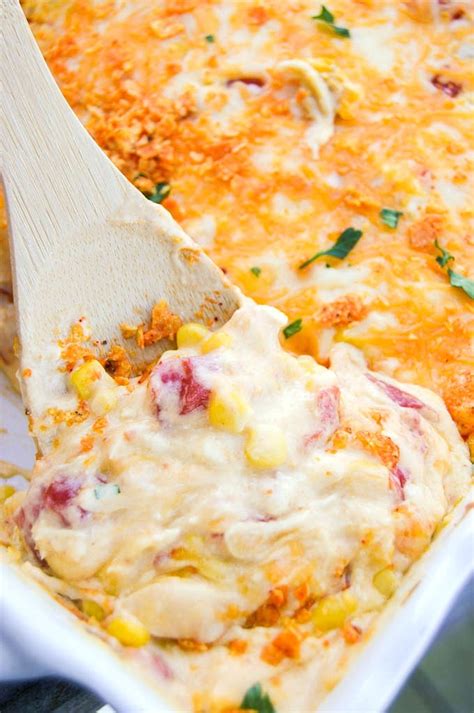 Pour into prepared pan, on top of crushed chips. Creamy Cheesy Dorito Chicken Casserole | YellowBlissRoad.com