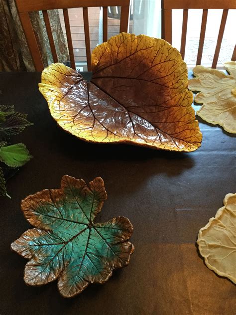 Hand painted cement leaf by Barbara H | Concrete garden ornaments