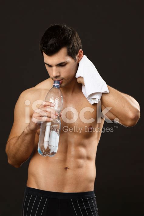 Muscular Young Man Drinking Water Stock Photo Royalty Free Freeimages