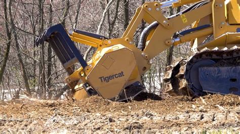 Watch Logging Machines In Action 480B Mulcher With 4061 Tigercat