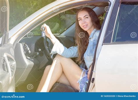 Young Woman Driving Her Car Attractive Young Girl Driver In New Car Girl Bought A Car Stock
