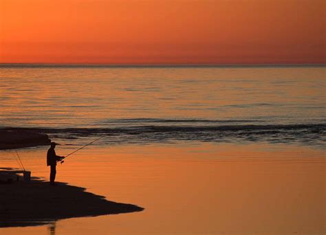 Fisherman At Sunset Photograph By Twenty Two North Photography