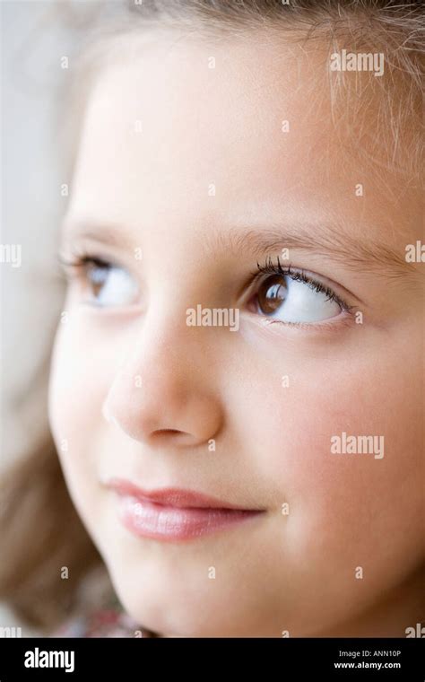 Close Up Of Girl Looking Sideways Stock Photo Alamy