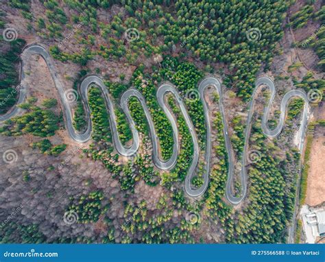 Aerial Photography Of A Winding Road In The Mountains Stock Photo