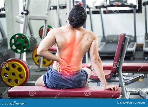Man Have Injury A Back Pain After Workout In Gym Stock Image Image Of