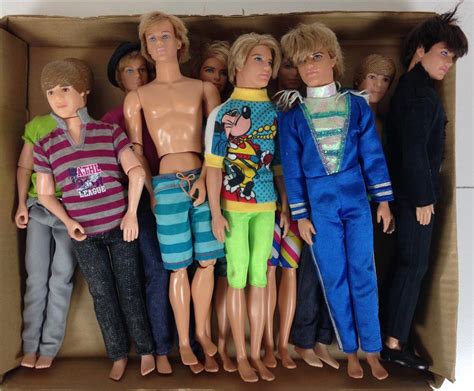 lot 10 unboxed newer ken and justin bieber dolls