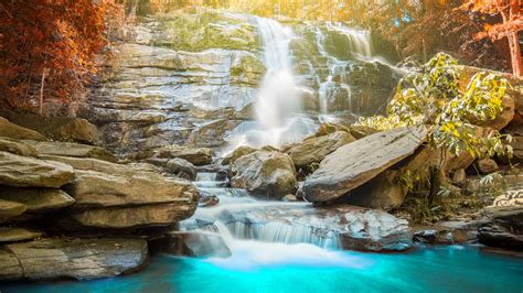 Download 2560x1440 Waterfall Rocks Stream Blue Water Wallpapers For