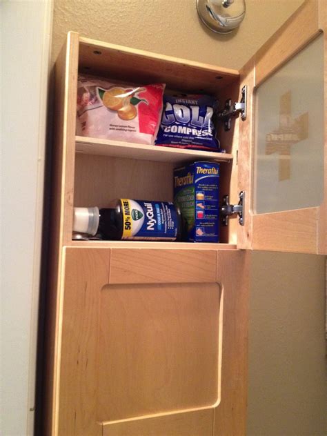Another option is to build a partial wall next to your toilet. Lots of Lemons: Ikea Medicine Cabinet and First Aid Kit