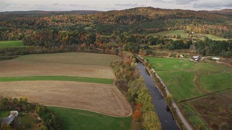 6k Stock Footage Aerial Video Flying Over Ammonoosuc River By Farms
