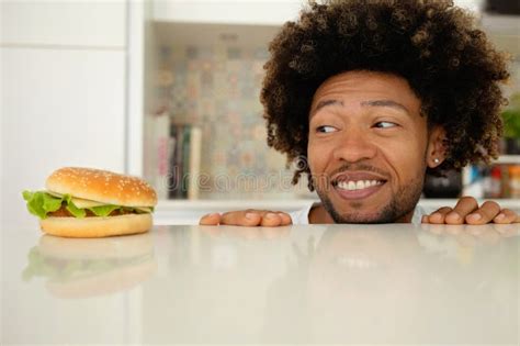 Black Man Eating Burger Stock Photos Free Royalty Free Stock Photos From Dreamstime