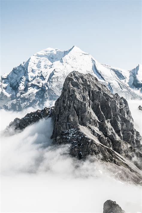Download Wallpaper 1440x2960 Snow Mountains Peak Clouds Switzerland