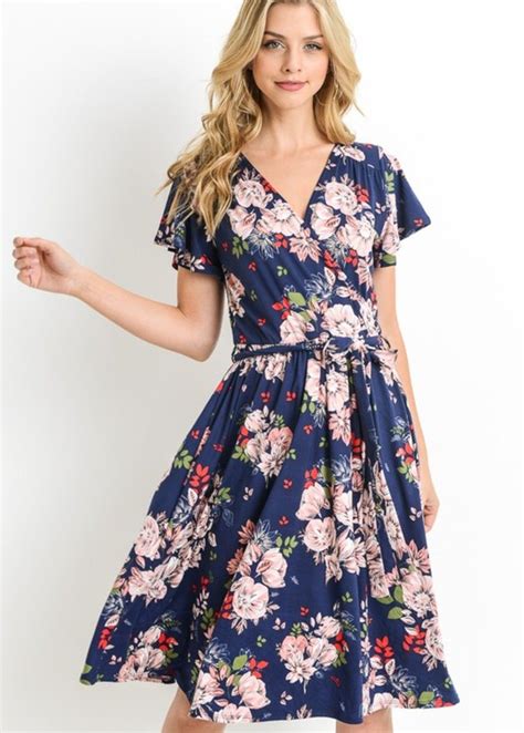 This Floral Dress Features A Beautiful Floral Print A Wrap Style Front