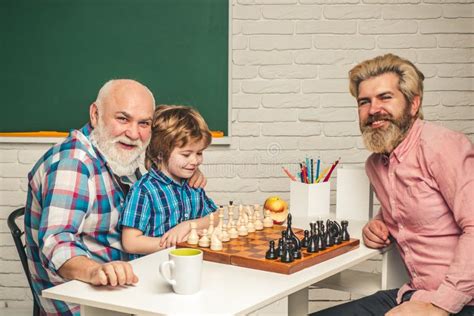 Father Teaching Son Play Chess Grandfather Educated Grandson