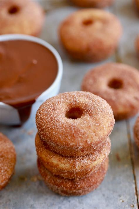 The batter is poured into a donut pan and baked. Churro Donuts (Baked Not Fried) - Gemma's Bigger Bolder Baking