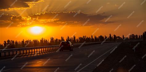 Premium Photo Picturesque Landscape Scene And Sunrise Above Road