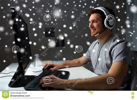 Man In Headset Playing Computer Video Game At Home Stock Image Image