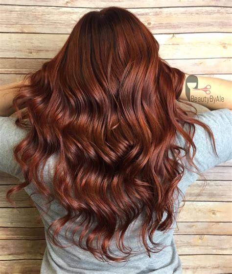 5 reasons auburn hair should be your next new shade (plus ways to wear it on your hair type!) 5 reasons we love auburn hair color. Dark copper hair | Hair color auburn, Hair color plum ...