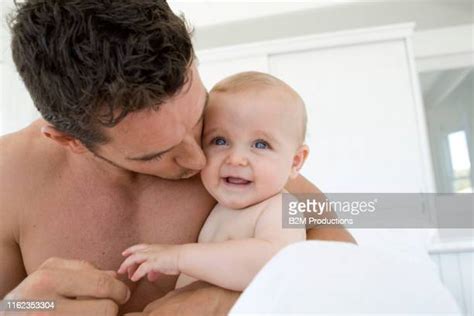 Dad Kissing Baby Chest Photos And Premium High Res Pictures Getty Images