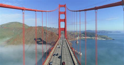 Aerial View Of The Golden Gate Bridge In Fog San Francisco Drone