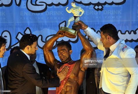 Afghan Bodybuilder Mohammad Yousuf Sakhi Lifts A Trophy After He News Photo Getty Images