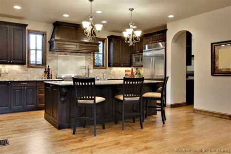 This blue, and all dark blues, are cool colors that will accent the cabinets. Pictures of Kitchens - Traditional - Dark Wood, Walnut ...