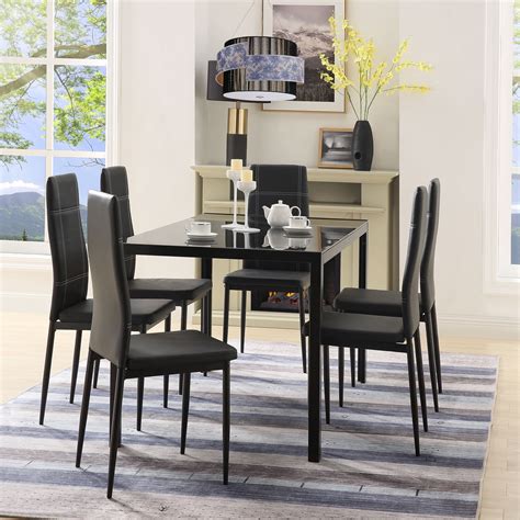 The rectangle table shape will easily fit in your dining room. Metal Dining Table Set with 6 Chairs, Heavy-Duty Tempered ...