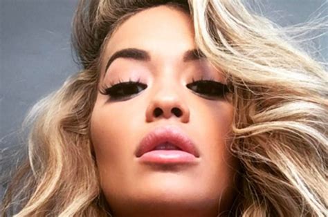 rita ora your song singer flashes cleavage in sexy promo snap daily star