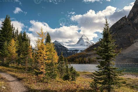 Mount Assiniboine With Autumn Forest On Lake Magog At Provincial Park
