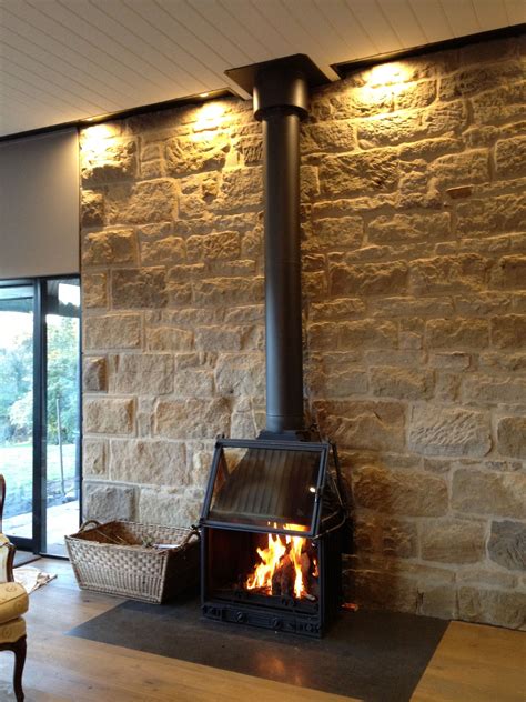 While not usually required for gas stoves, hearth. A beautiful cast iron fireplace by Cheminees Philippe ...