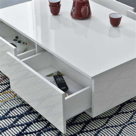 Der elegant designte couchtisch abby ist variabel einsetzbar, denn dank seiner weißen hochglanzlackierung passt er zu vielen modernen einrichtungsserien. Couchtisch Wohnzimmertisch mit 4 Schubladen Beistelltisch ...