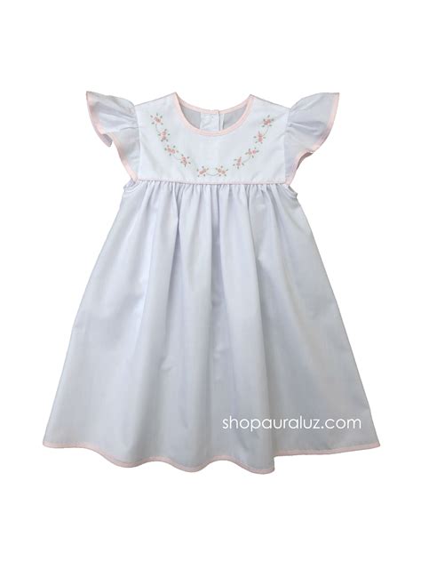 auraluz dress angel sleeve white with pink trim and embroidered tiny auraluz