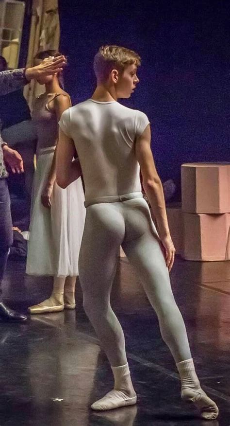 Male Ballet Dancers Performing On Stage