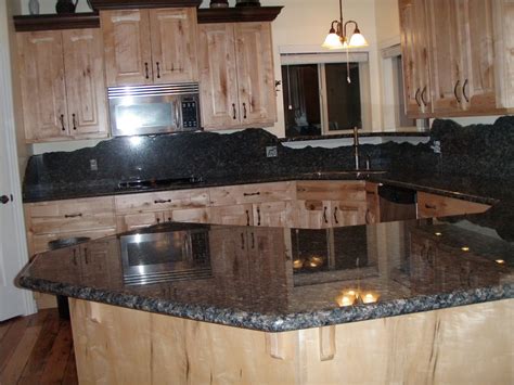 Tile backsplash ideas for black granite countertops. Stone Solutions Granite: Granite or Tile Backsplash