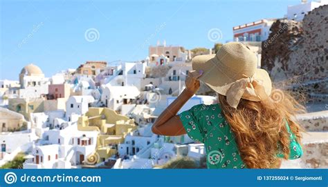 Tourist Traveler Girl In Oia Santorini Island In Greece Europe Travel