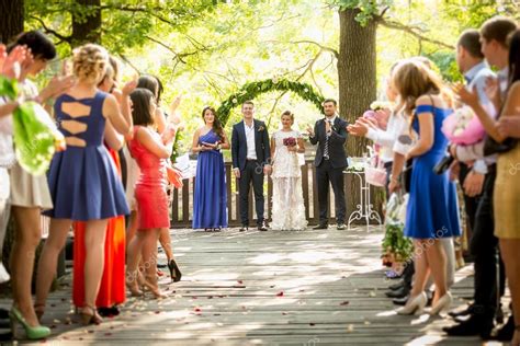 Outdoor Wedding Ceremony At Park With Lot Of Guests Stock Photo By