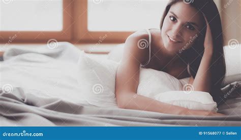 Beautiful Brunette Lying On Bed At Home Stock Image Image Of Studio