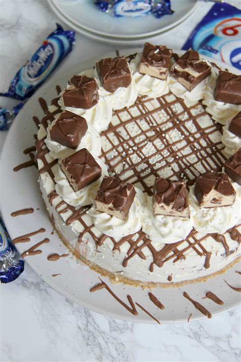 I chose to buy a graham cracker crust, which made it even easier. No-Bake Milky Way Cheesecake! - Jane's Patisserie