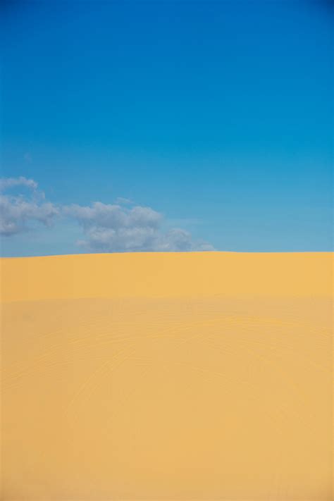 Photo Of Desert Under Blue Sky · Free Stock Photo