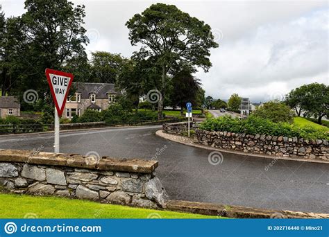 Give Way Traffic Sign At T Junction In A Small Scottish Town Of