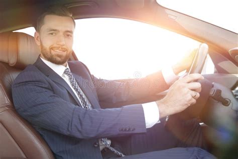 Portrait Of Confident Businessman Driving A Car Stock Photo Image Of