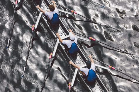 Overhead View Of A Crew Rowing In An Octuple Racing Shell Boat Rowers