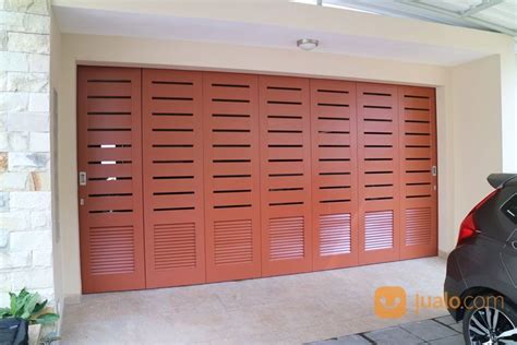 Pintu lipat besi untuk toko | pintu henderson. Pintu Garasi Besi, Pintu Garasi Besi Sliding, Pintu Garasi ...