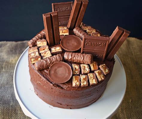 I have not purchased chocolate bars in a while yet as i have been enjoying 100% cacao powder and 100. Candy Bar Stash Chocolate Cake - Modern Honey