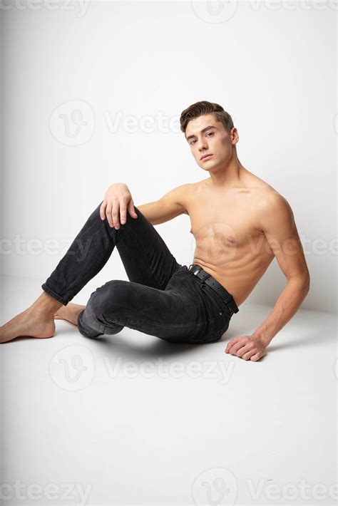 Handsome Man Sits On The Floor Bared Muscular Torso Attractive Isolated